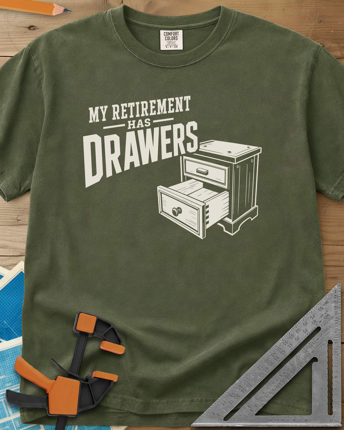 Retirement Drawers heavyweight tee in Hemp, a small chest of drawers with one drawer pulled open