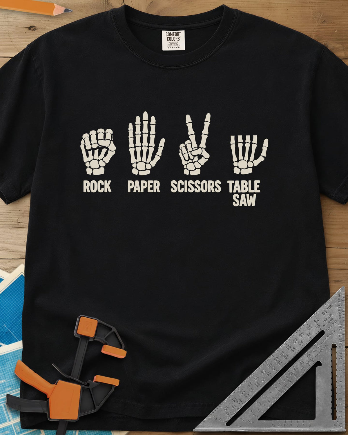 Rock Paper Saw heavyweight tee in Black, four skeleton hands, the last with its fingers cut short
