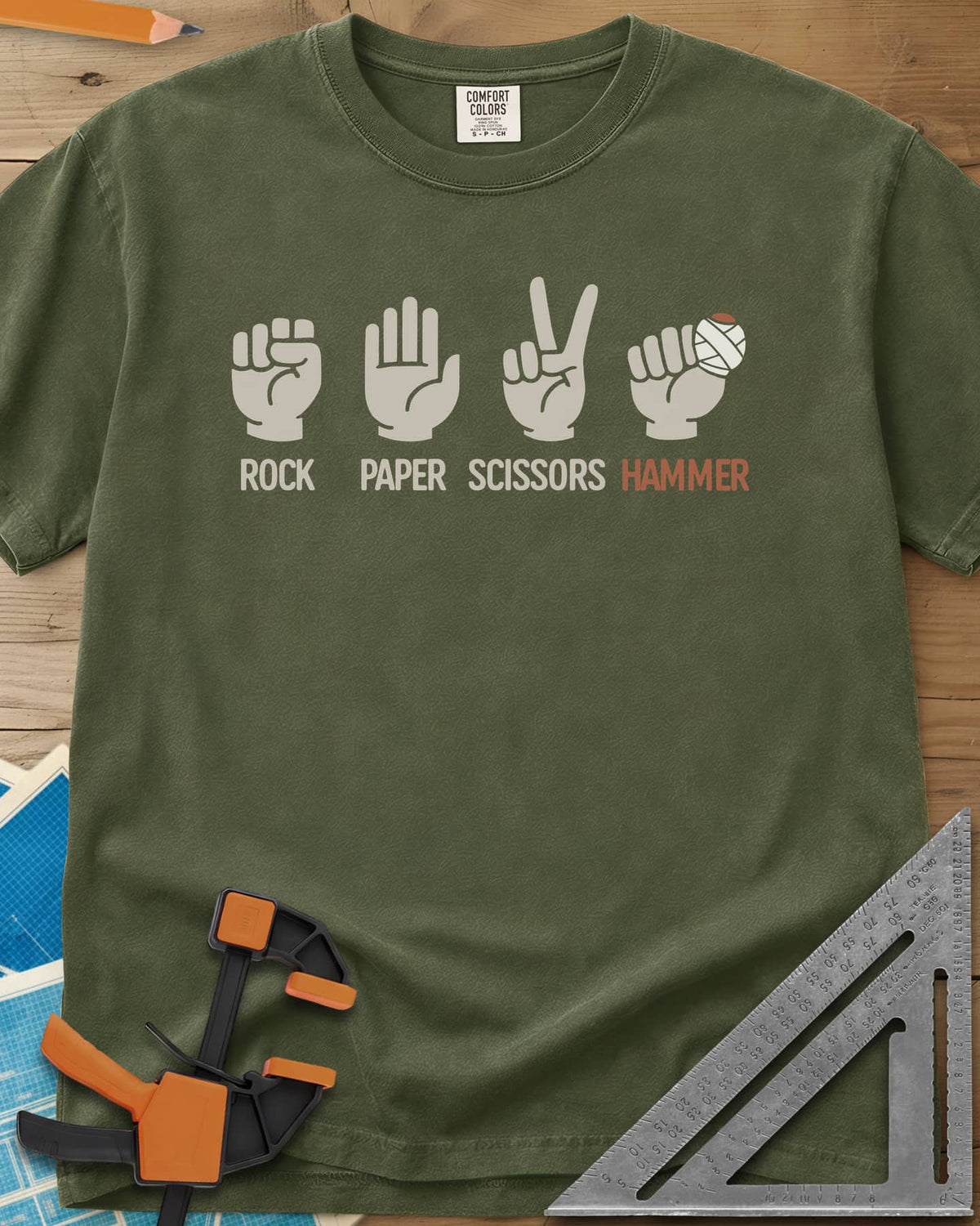 Rock, Paper, Scissors, Hammer heavyweight tee in Hemp, four hand signs, the last a fist with a bandaged thumb