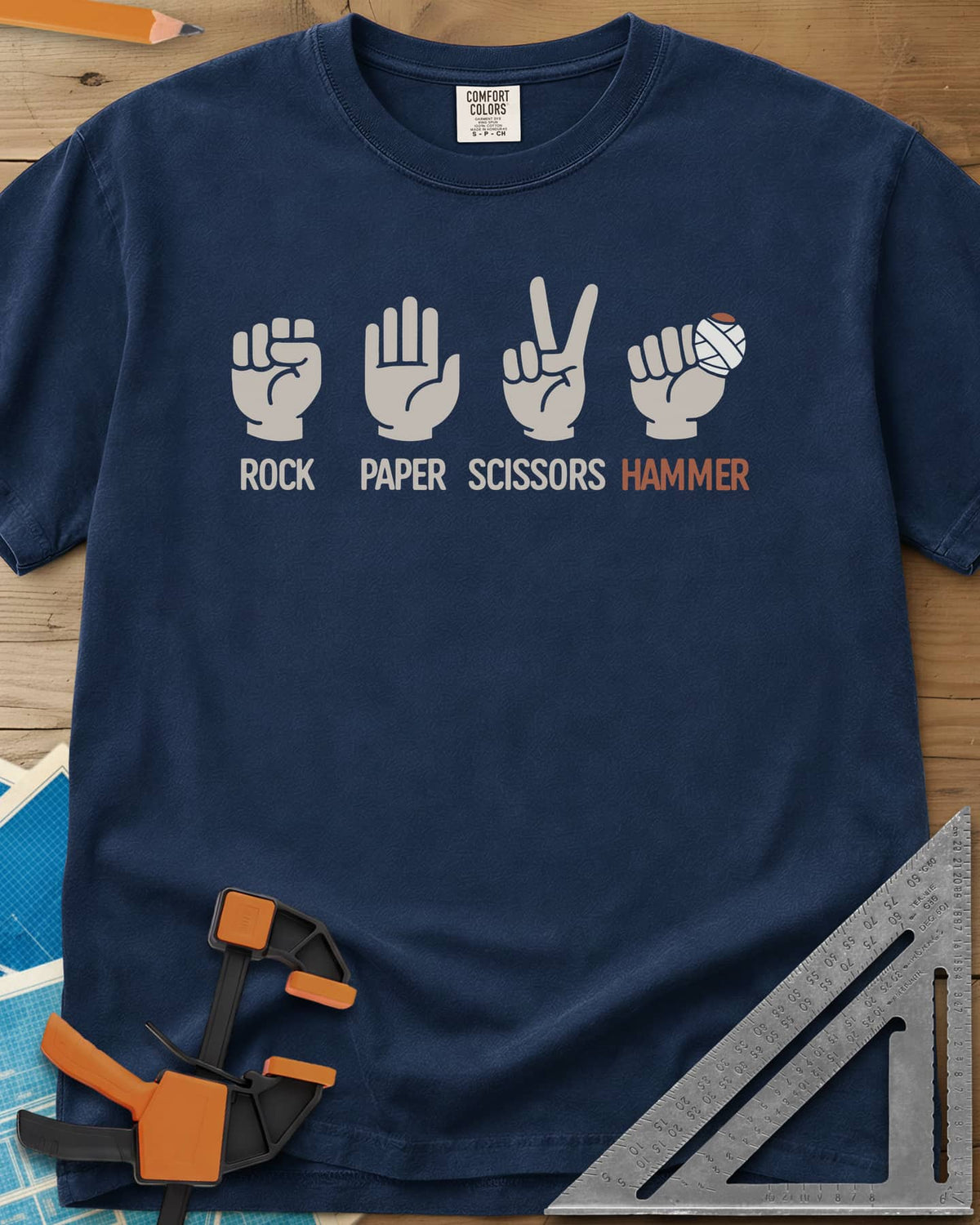 Rock, Paper, Scissors, Hammer heavyweight tee in Navy, four hand signs, the last a fist with a bandaged thumb