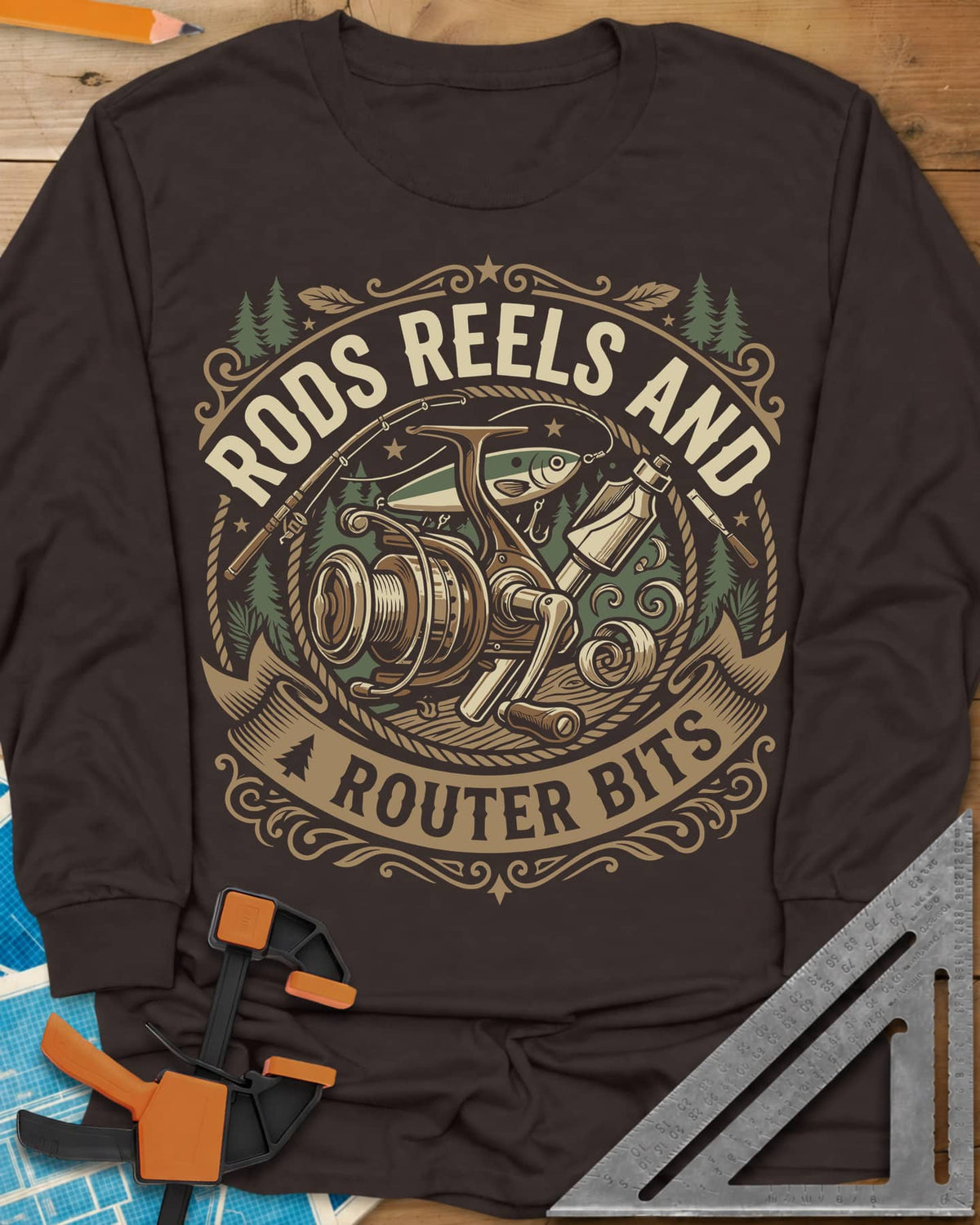 Rods Reels And Router Bits long sleeve shirt in Dark Chocolate, a round badge with a fishing reel, rods, a lure and a router
