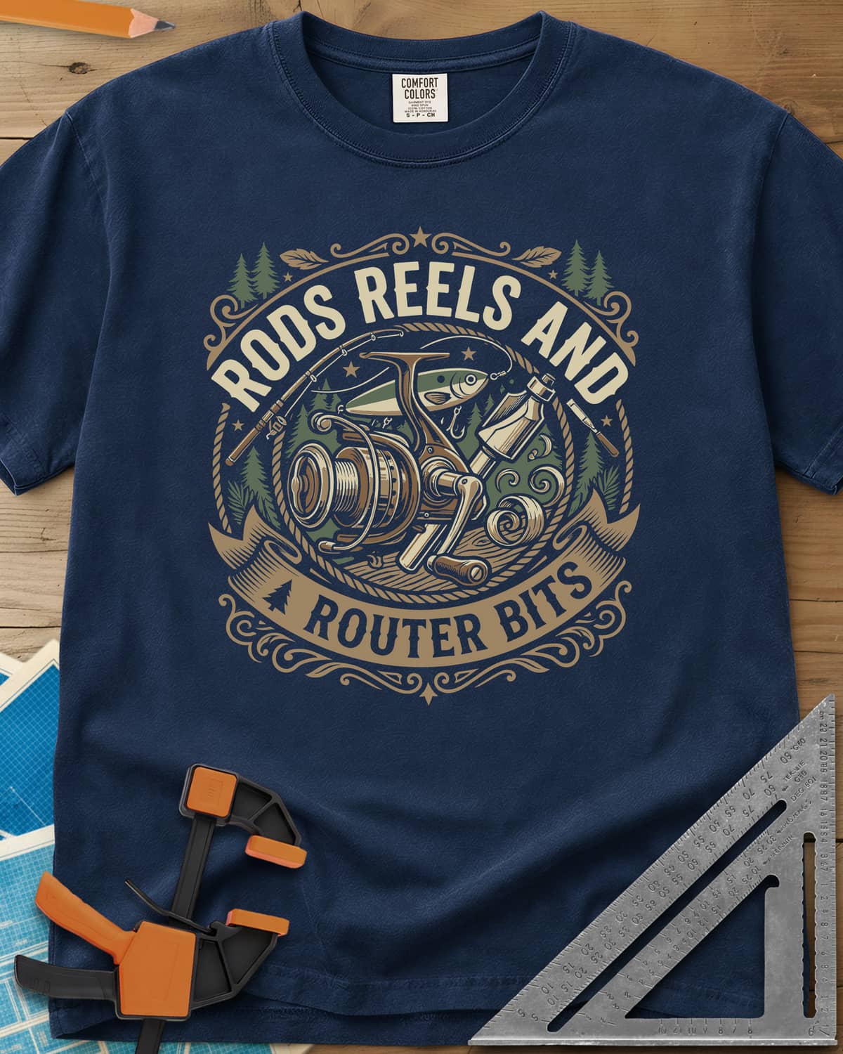 Rods Reels And Router Bits heavyweight tee in Navy, a round badge with a fishing reel, rods, a lure and a router bit