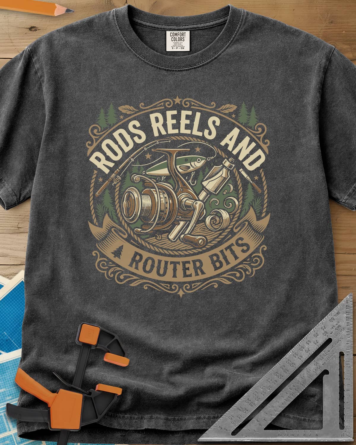 Rods Reels And Router Bits heavyweight tee in Pepper, a round badge with a fishing reel, rods, a lure and a router bit