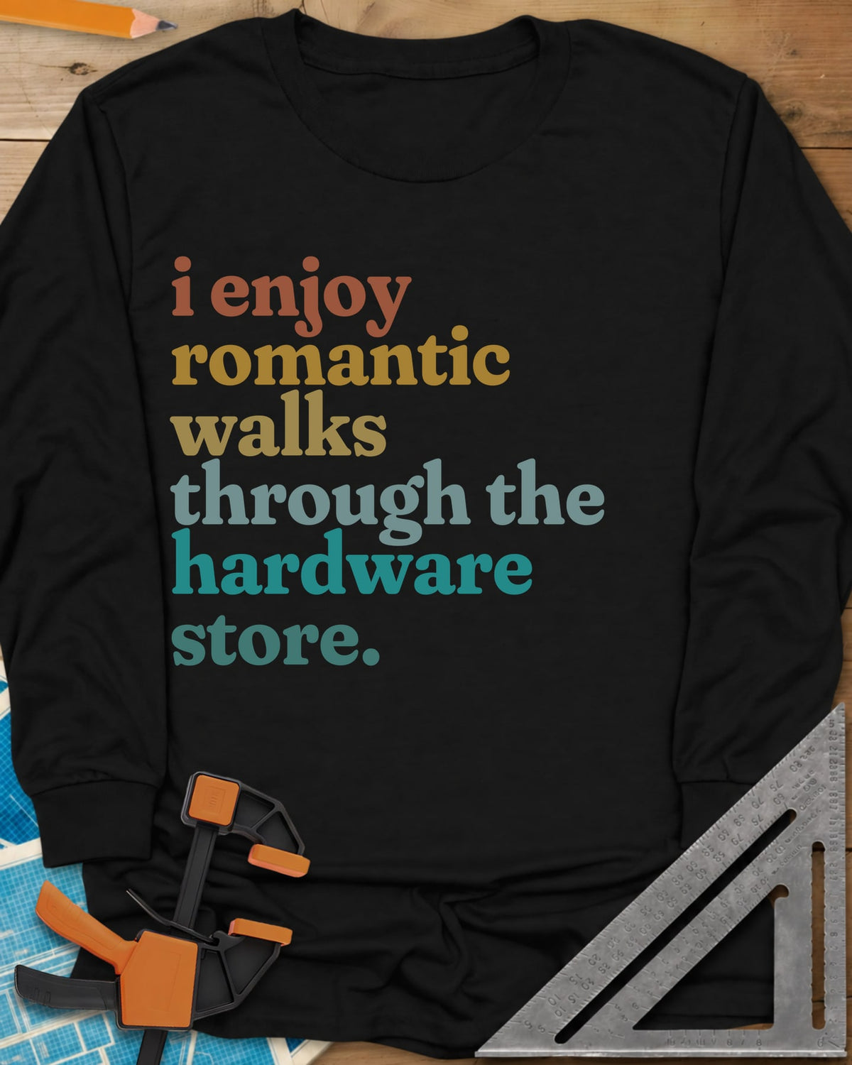 Romantic Walks long sleeve shirt in Black, stacked lowercase words in rust, mustard, sage and teal