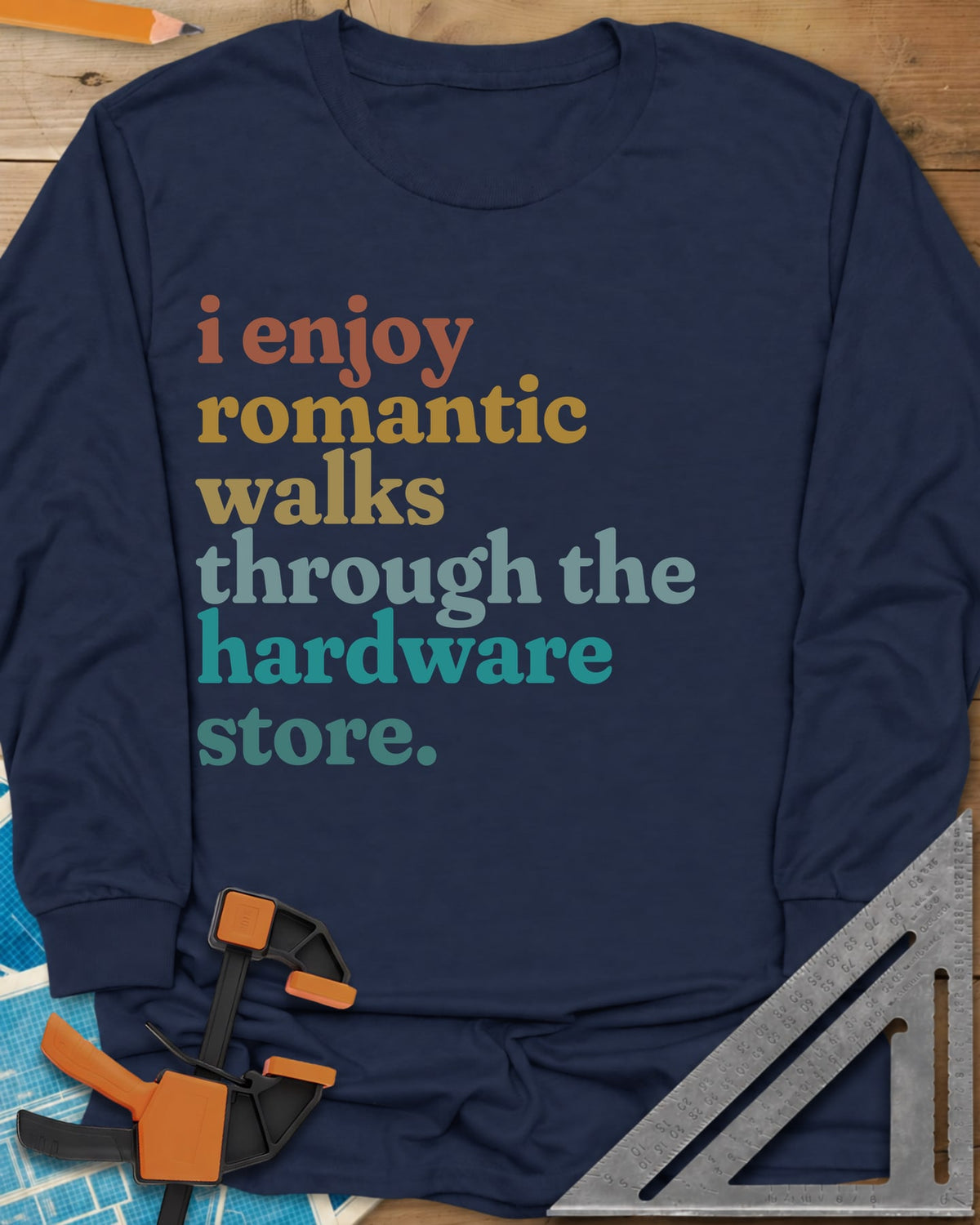 Romantic Walks long sleeve shirt in Navy, stacked lowercase words in rust, mustard, sage and teal