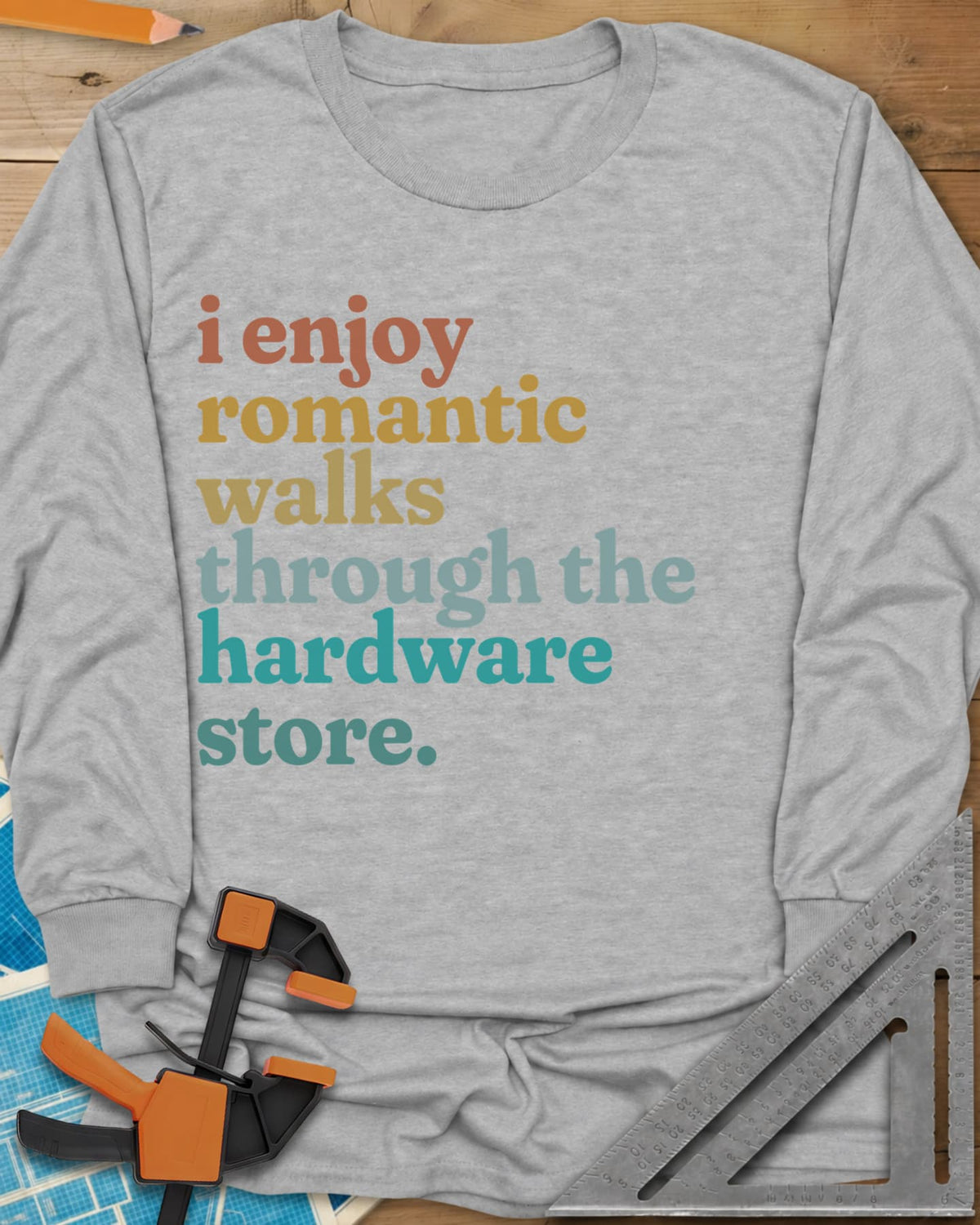 Romantic Walks long sleeve shirt in Sport Grey, stacked lowercase words in rust, mustard, sage and teal