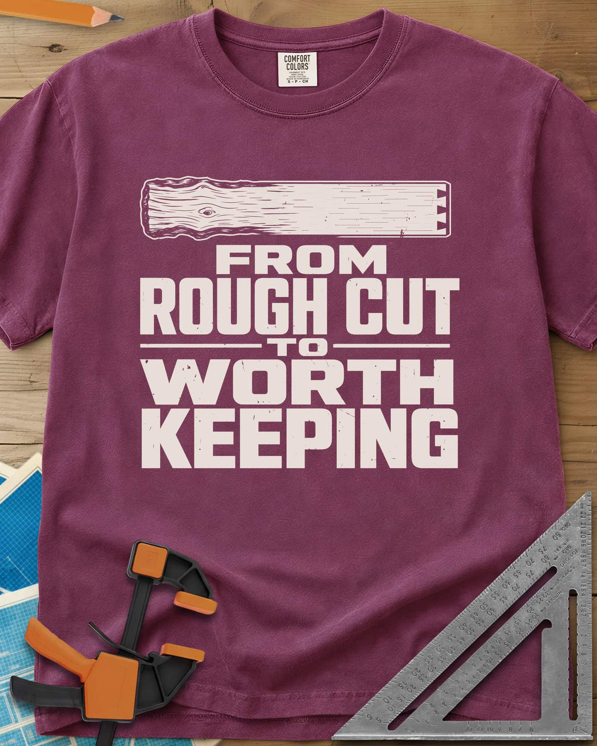 Rough To Worthy heavyweight tee in Berry, a board going from rough knotty grain to smooth, with a notched end