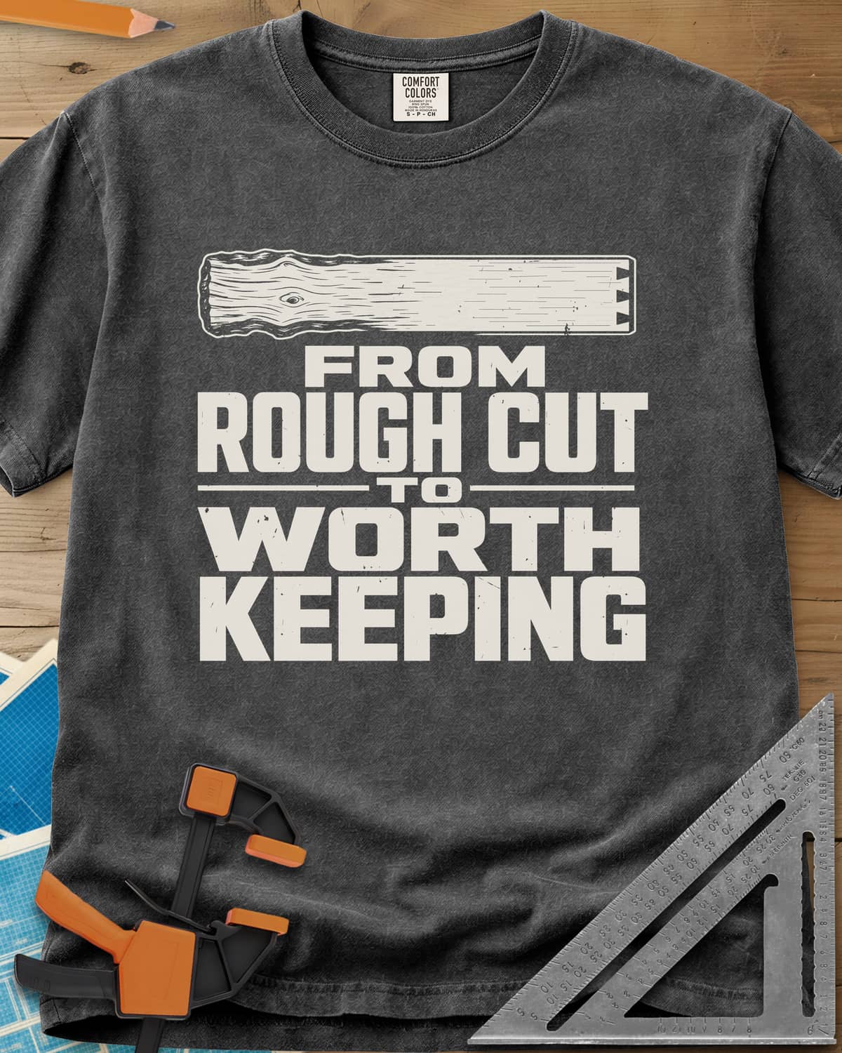 Rough To Worthy heavyweight tee in Pepper, a board going from rough knotty grain to smooth, with a notched end
