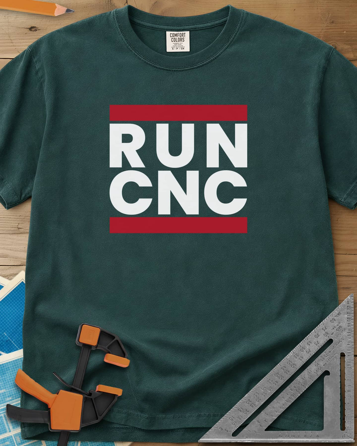 Run CNC heavyweight tee in Blue Spruce, bold block lettering between two red bars