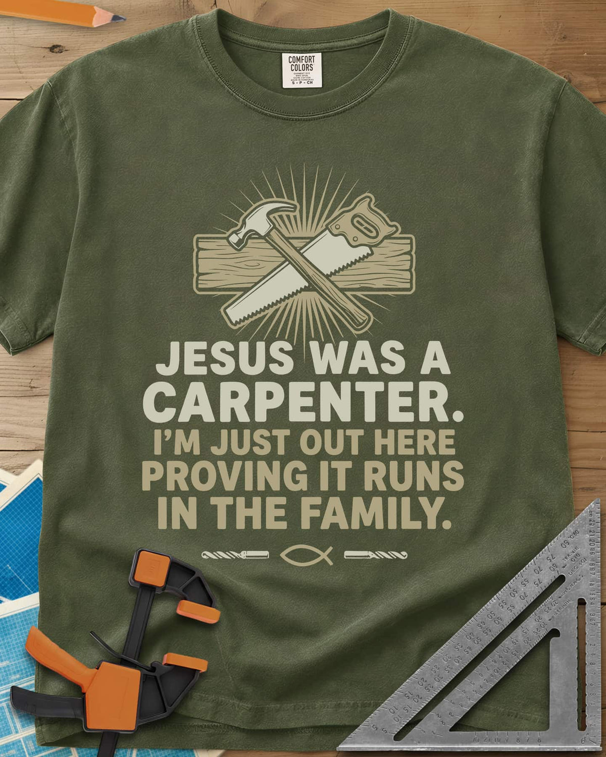 Runs In The Family Jesus Carpenter heavyweight tee in Hemp, crossed hammer and handsaw over a plank, with a small fish symbol