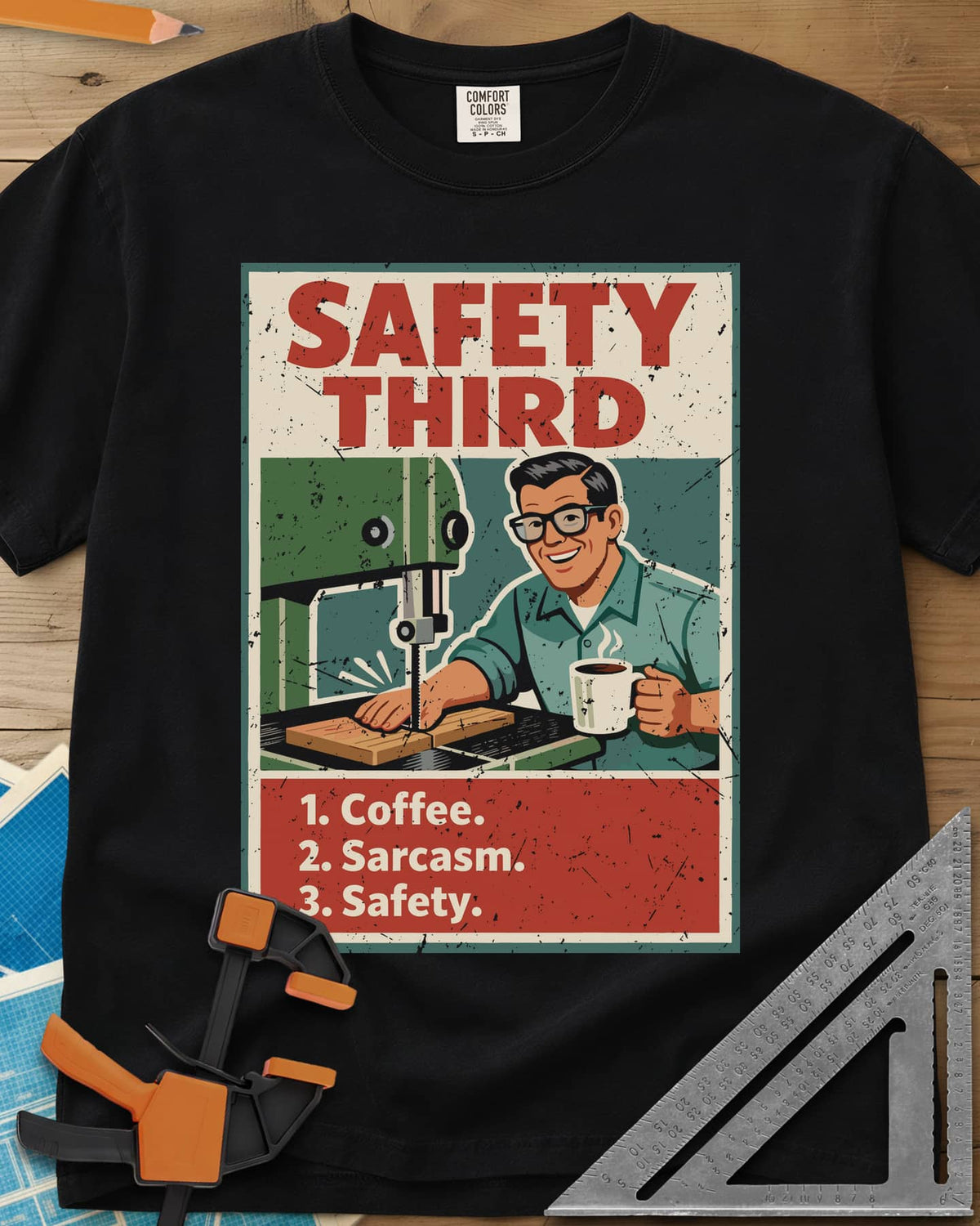 Safety Third heavyweight tee in Black, retro poster of a smiling man at a band saw holding a coffee mug