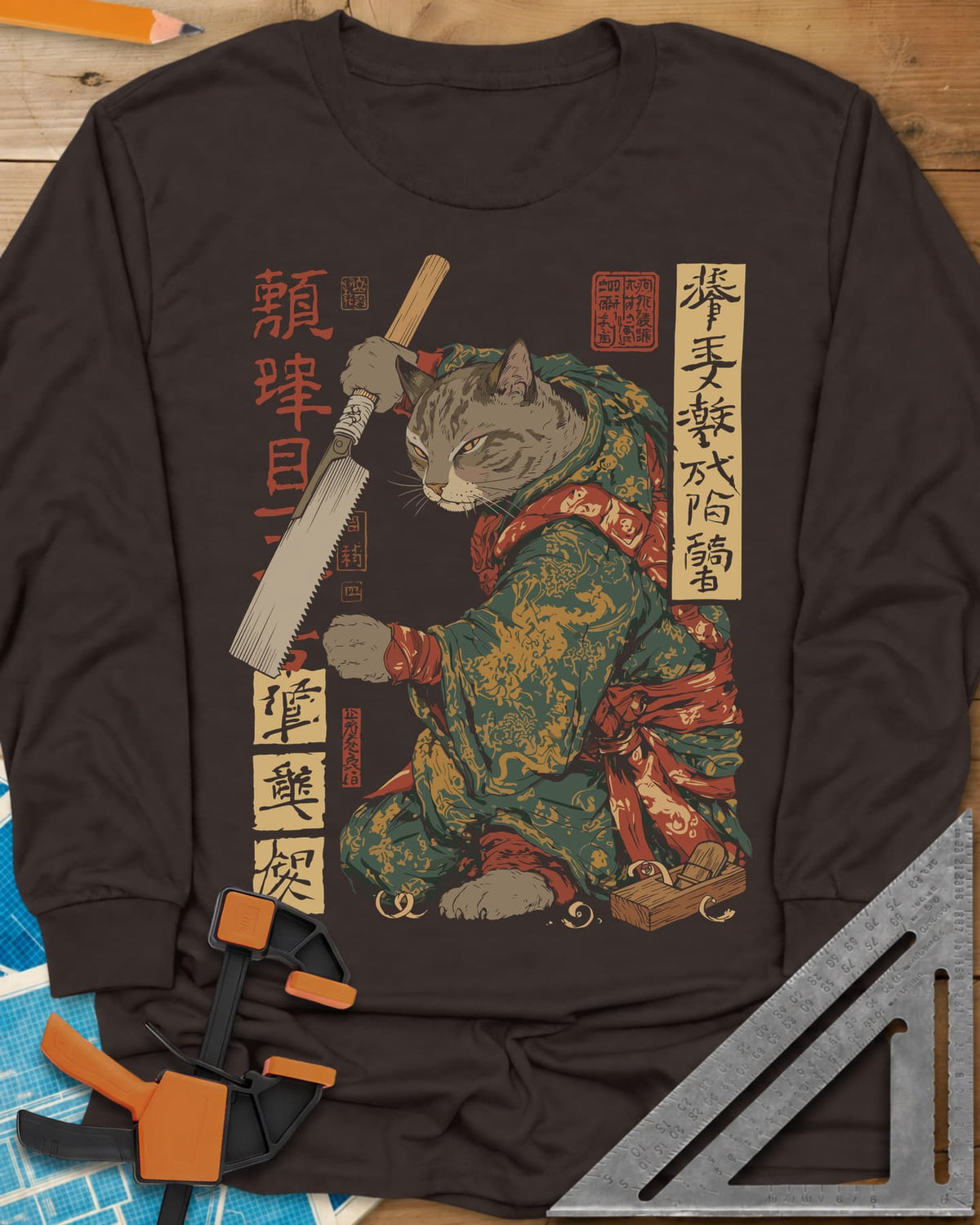 Samurai Cat Woodworker Japanese Hand Saw long sleeve shirt in Dark Chocolate, a tabby samurai cat in a kimono holding a