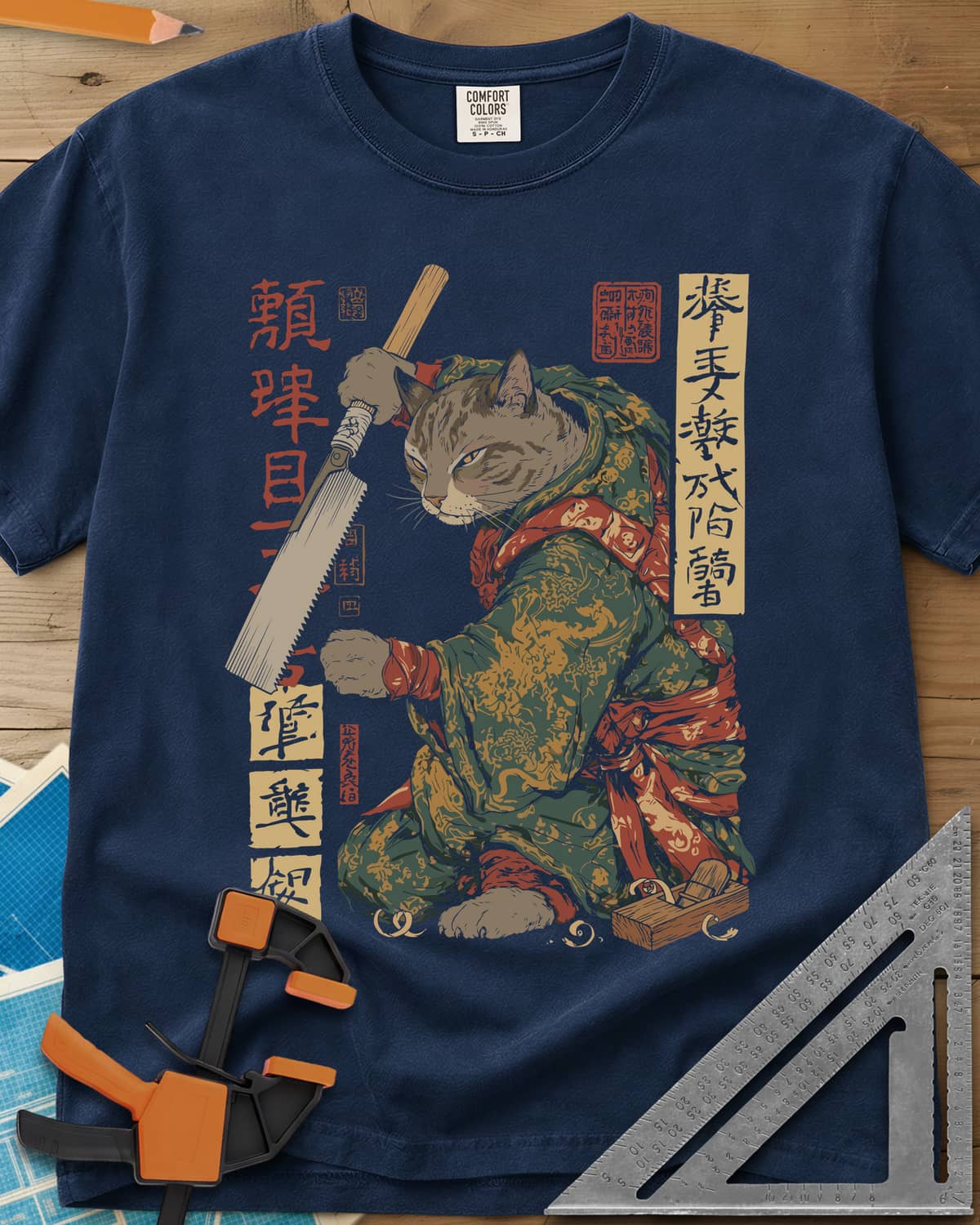 Samurai Cat Woodworker Japanese Hand Saw heavyweight tee in Navy, a tabby samurai cat in a kimono holding a Japanese pull saw