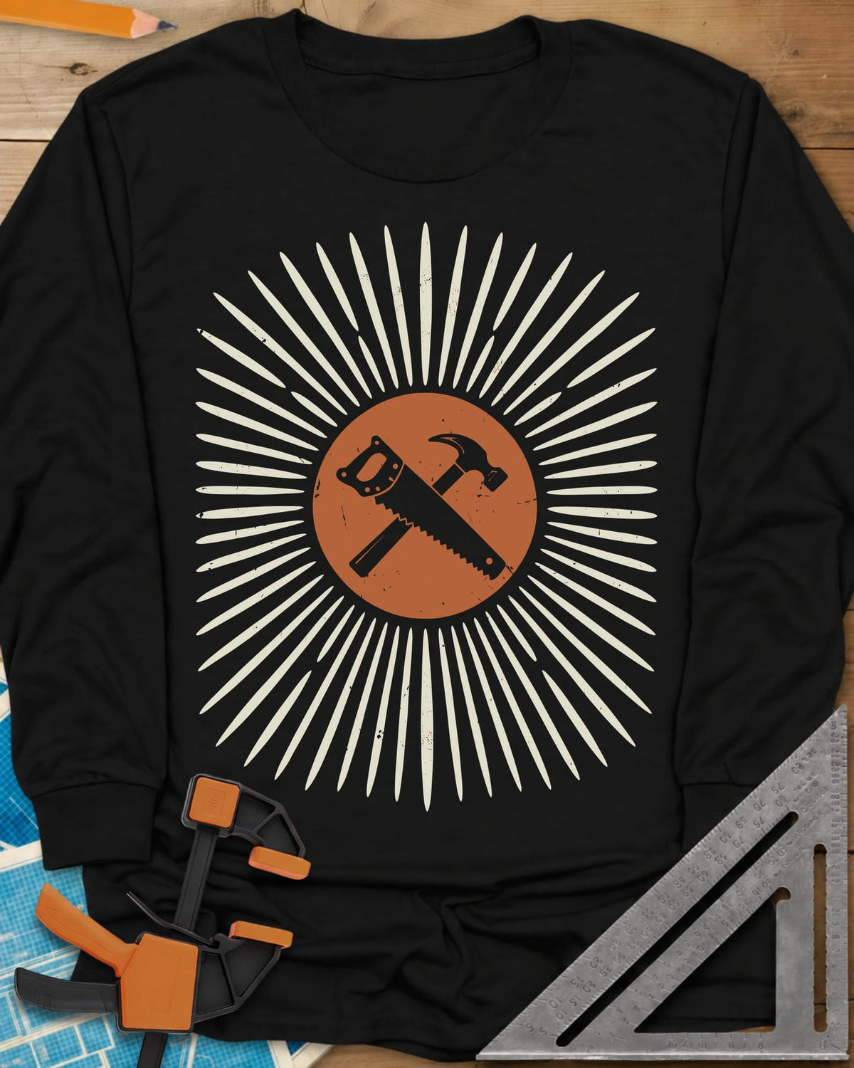 Saw & Hammer long sleeve shirt in Black, crossed handsaw and hammer on a rust circle in a sunburst of rays
