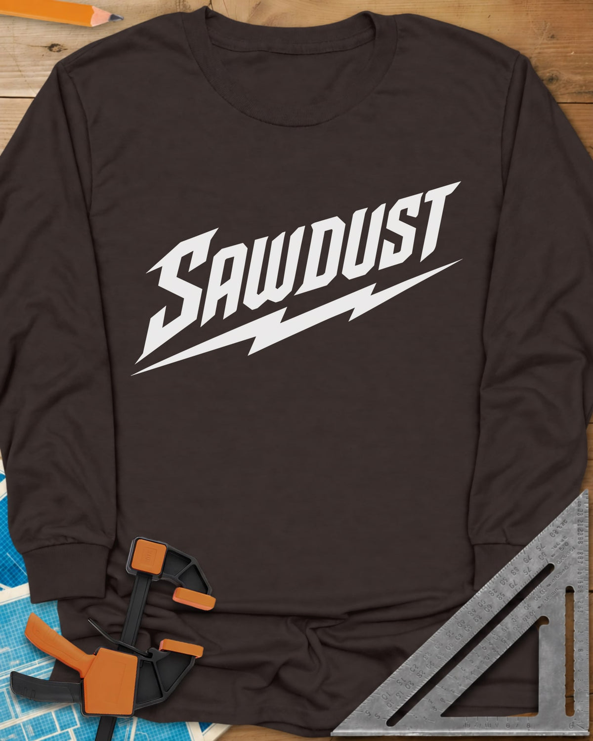 Sawdust Bolt long sleeve shirt in Dark Chocolate, bold slanted SAWDUST lettering with a lightning bolt underneath
