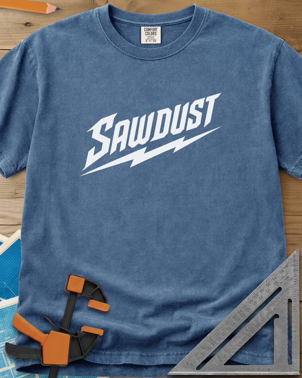 Sawdust Bolt heavyweight tee in Blue Jean, bold slanted SAWDUST lettering with a lightning bolt underneath