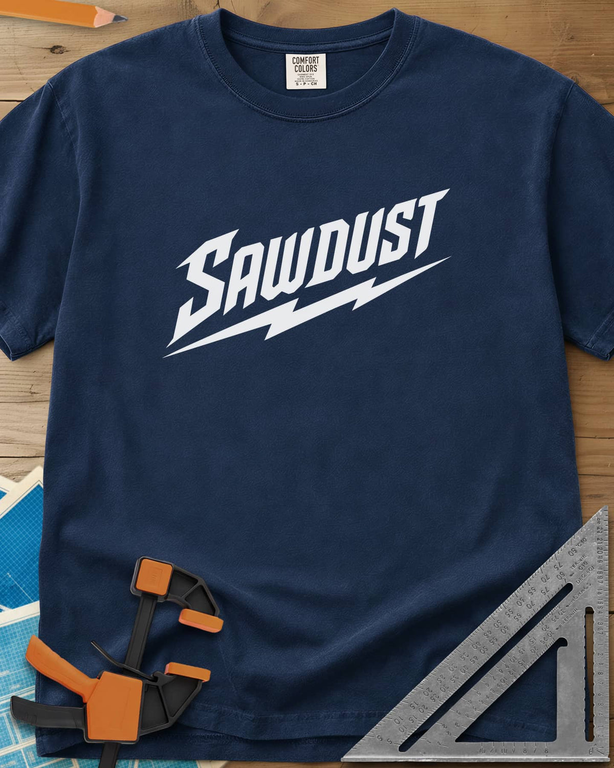 Sawdust Bolt heavyweight tee in Navy, bold slanted SAWDUST lettering with a lightning bolt underneath