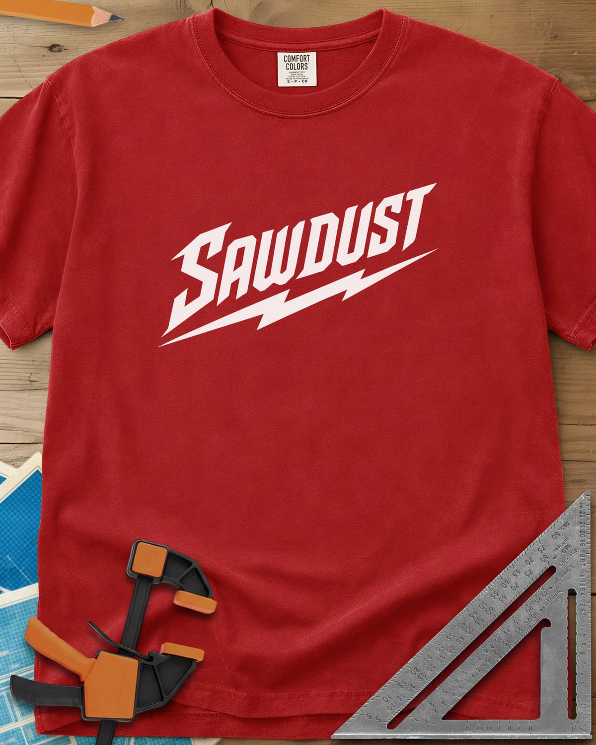 Sawdust Bolt heavyweight tee in Red, bold slanted SAWDUST lettering with a lightning bolt underneath