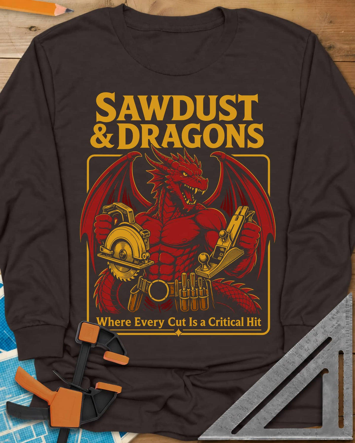 Sawdust & Dragons long sleeve shirt in Dark Chocolate, red dragon in a tool belt holding a circular saw and a hand plane
