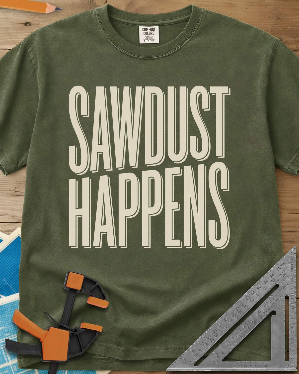 Sawdust Happens heavyweight tee in Hemp, tall condensed block letters with an offset shadow