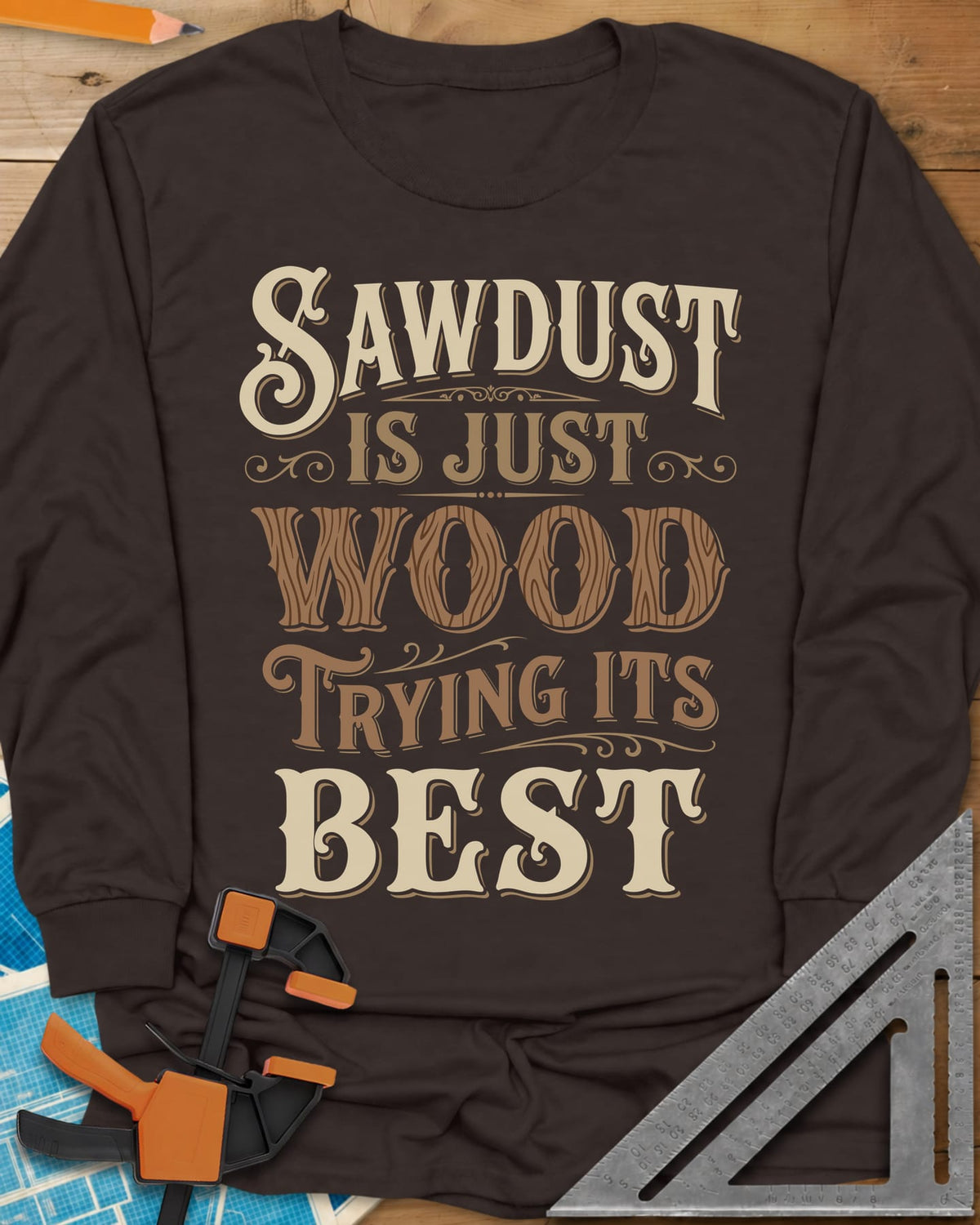 Sawdust Is Just Wood Trying Its Best long sleeve shirt in Dark Chocolate, ornate vintage lettering with a wood-grain filled