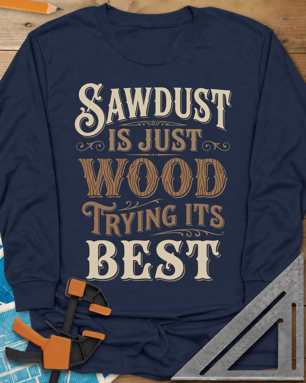 Sawdust Is Just Wood Trying Its Best long sleeve shirt in Navy, ornate vintage lettering with a wood-grain filled WOOD