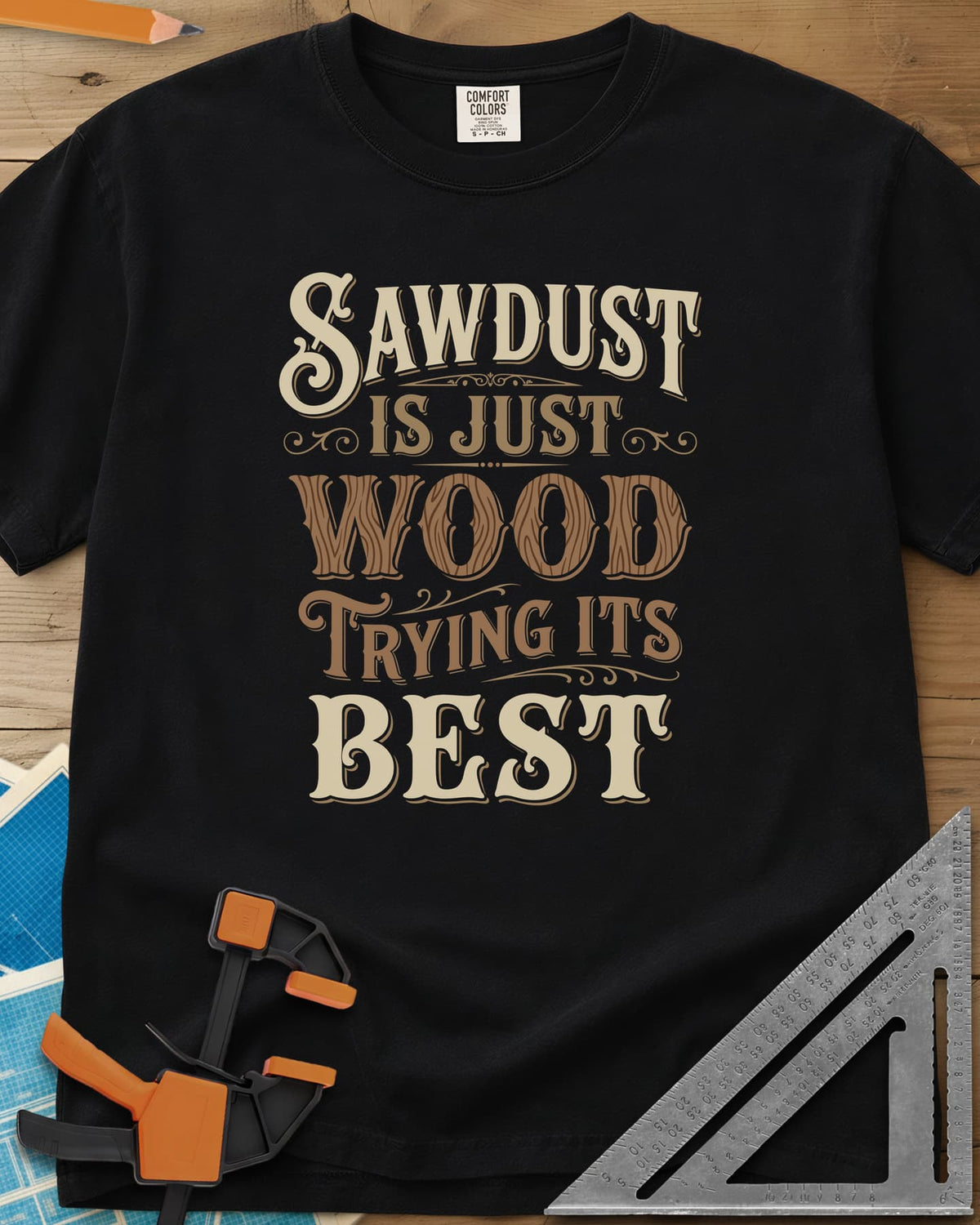 Sawdust Is Just Wood Trying Its Best heavyweight tee in Black, ornate vintage lettering with a wood-grain filled WOOD