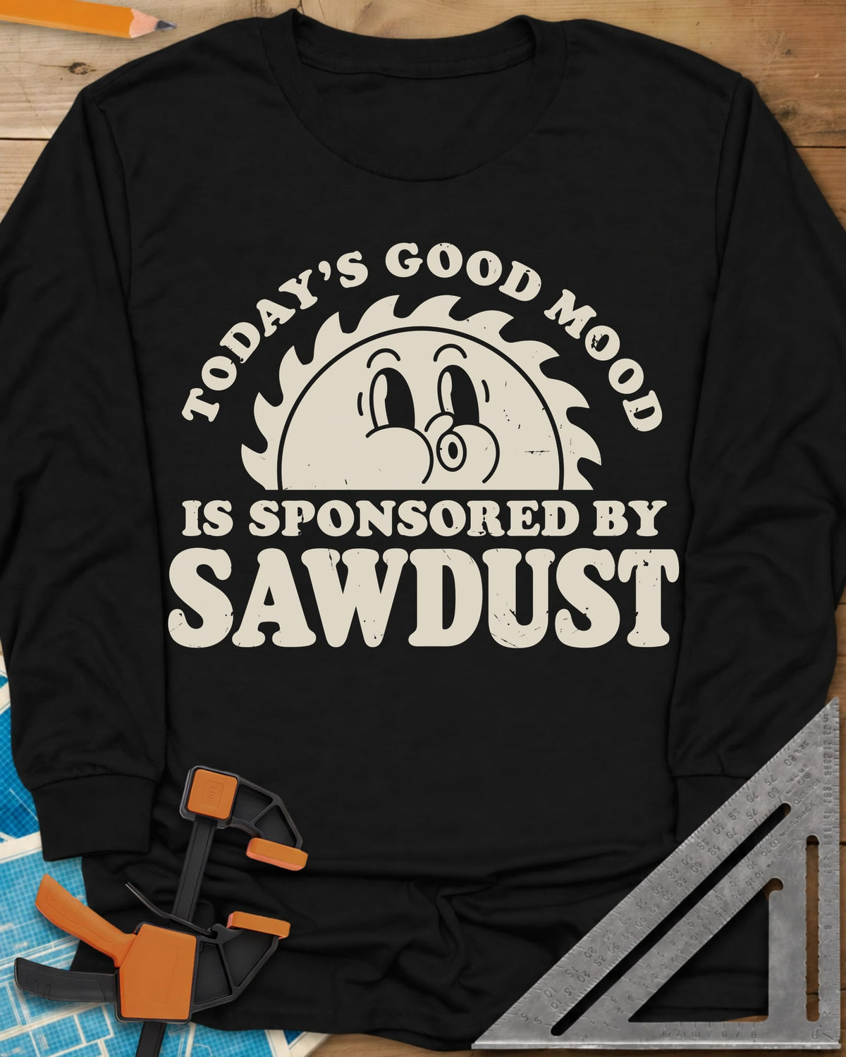 Sawdust Mood long sleeve shirt in Black, half saw blade rising like a sun with a retro cartoon face