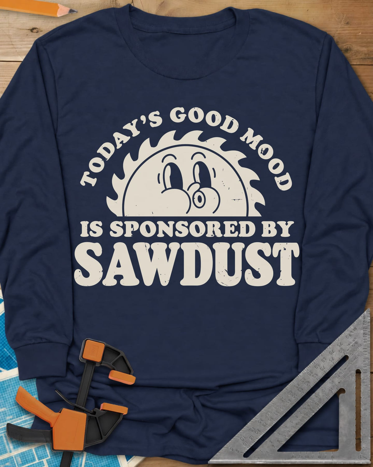 Sawdust Mood long sleeve shirt in Navy, half saw blade rising like a sun with a retro cartoon face