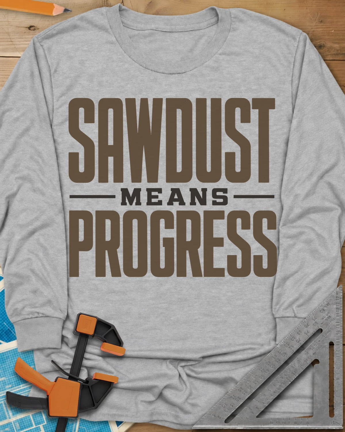 Sawdust Progress long sleeve shirt in Sport Grey, tall block letters with a small MEANS set between two rules