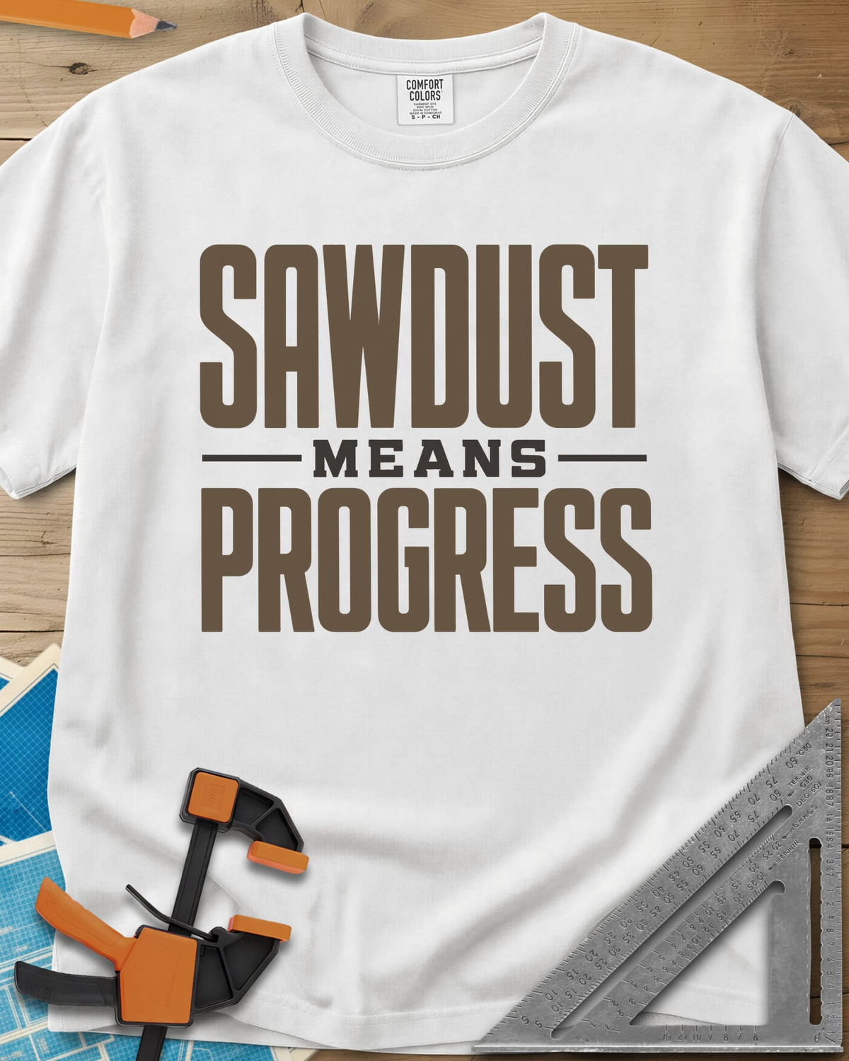 Sawdust Progress heavyweight tee in White, tall block letters with a small MEANS set between two rules