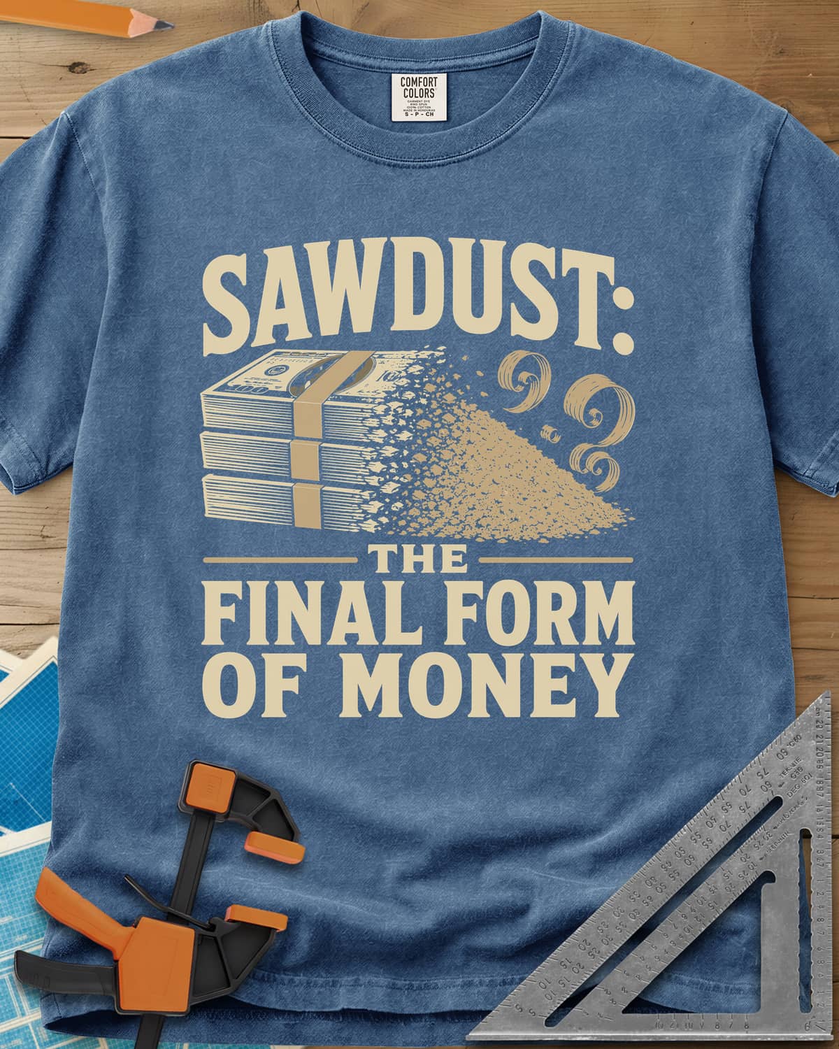 Sawdust The Final Form Of Money heavyweight tee in Blue Jean, a stack of bills crumbling into a pile of sawdust and curls