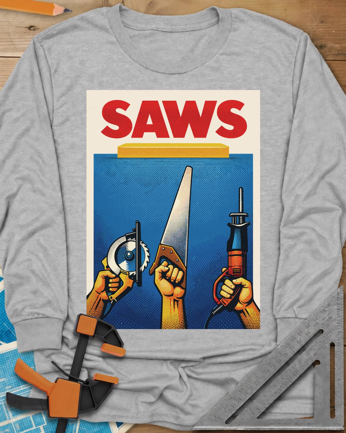 Saws Tool Pride long sleeve shirt in Sport Grey, three hands raising a circular saw, handsaw and reciprocating saw