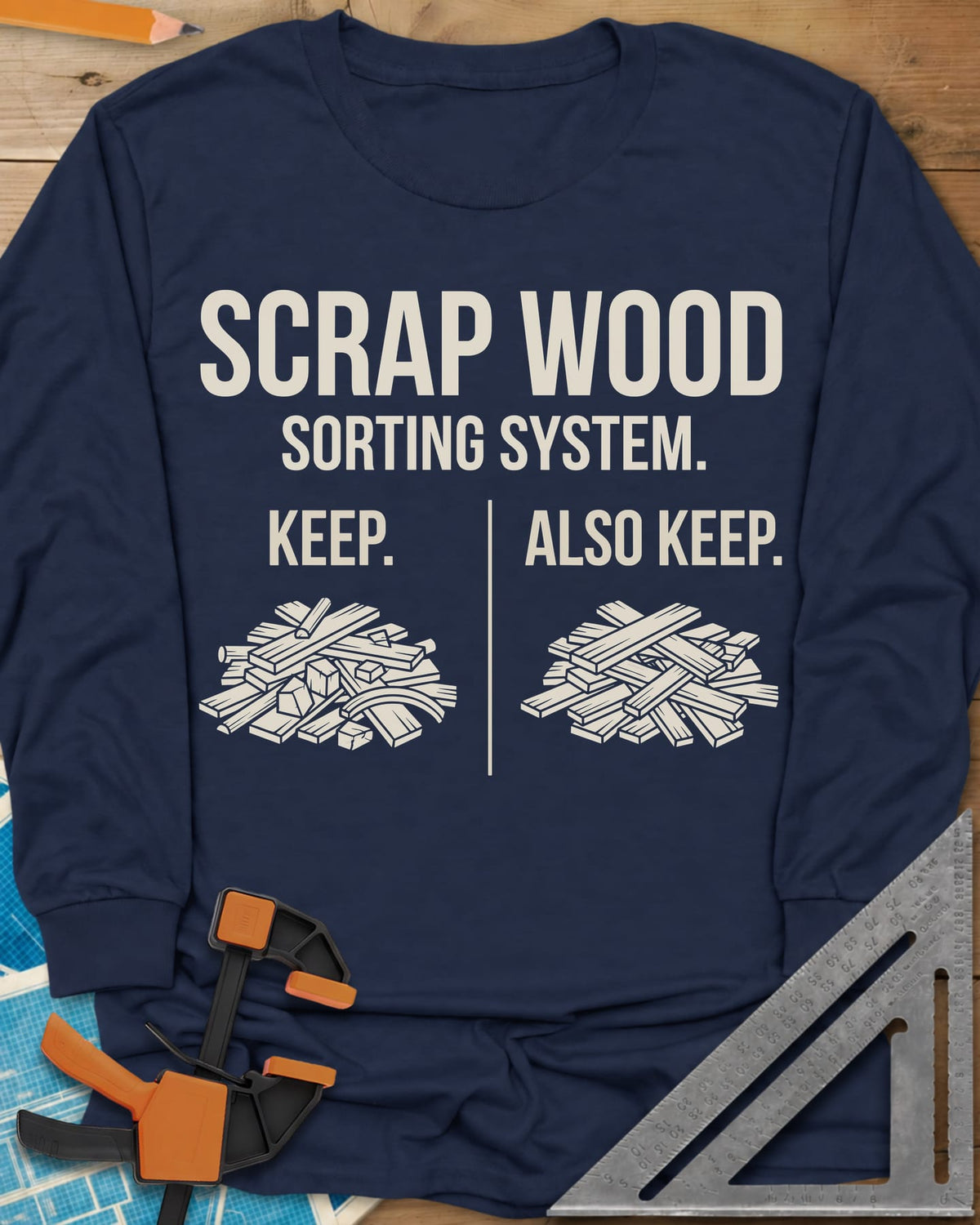 Scrap Wood Sorting System long sleeve shirt in Navy, two piles of scrap lumber split by a thin vertical line