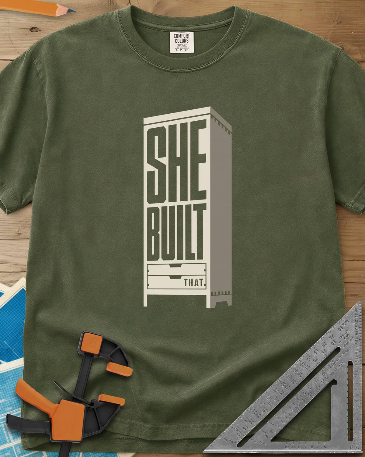 She Built heavyweight tee in Hemp, stacked letters set into a tall cabinet with two drawers