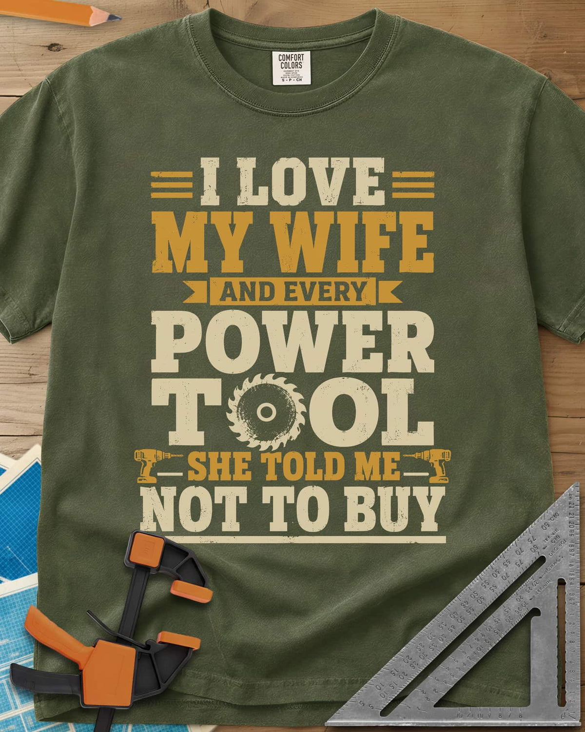 She Told Me Not To Buy Power Tools heavyweight tee in Hemp, stacked lettering with a saw blade for the O and two cordless