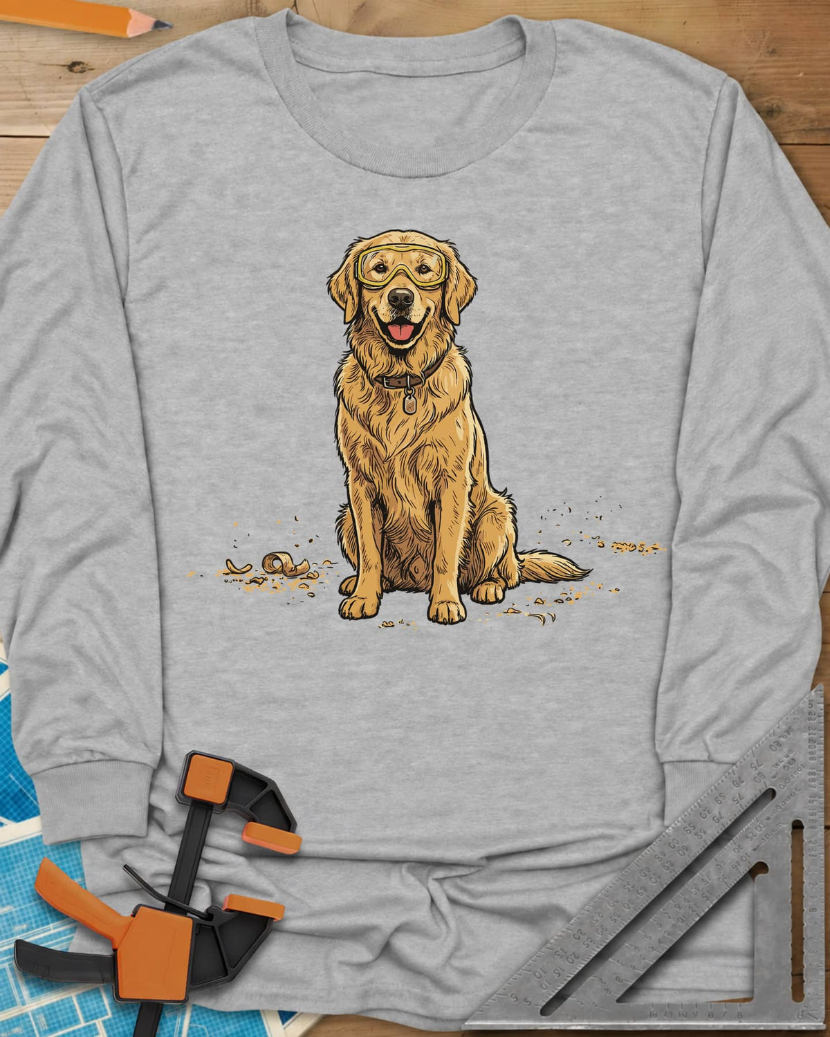Shop Dog Safety First long sleeve shirt in Sport Grey, a golden retriever in safety goggles sitting in wood shavings