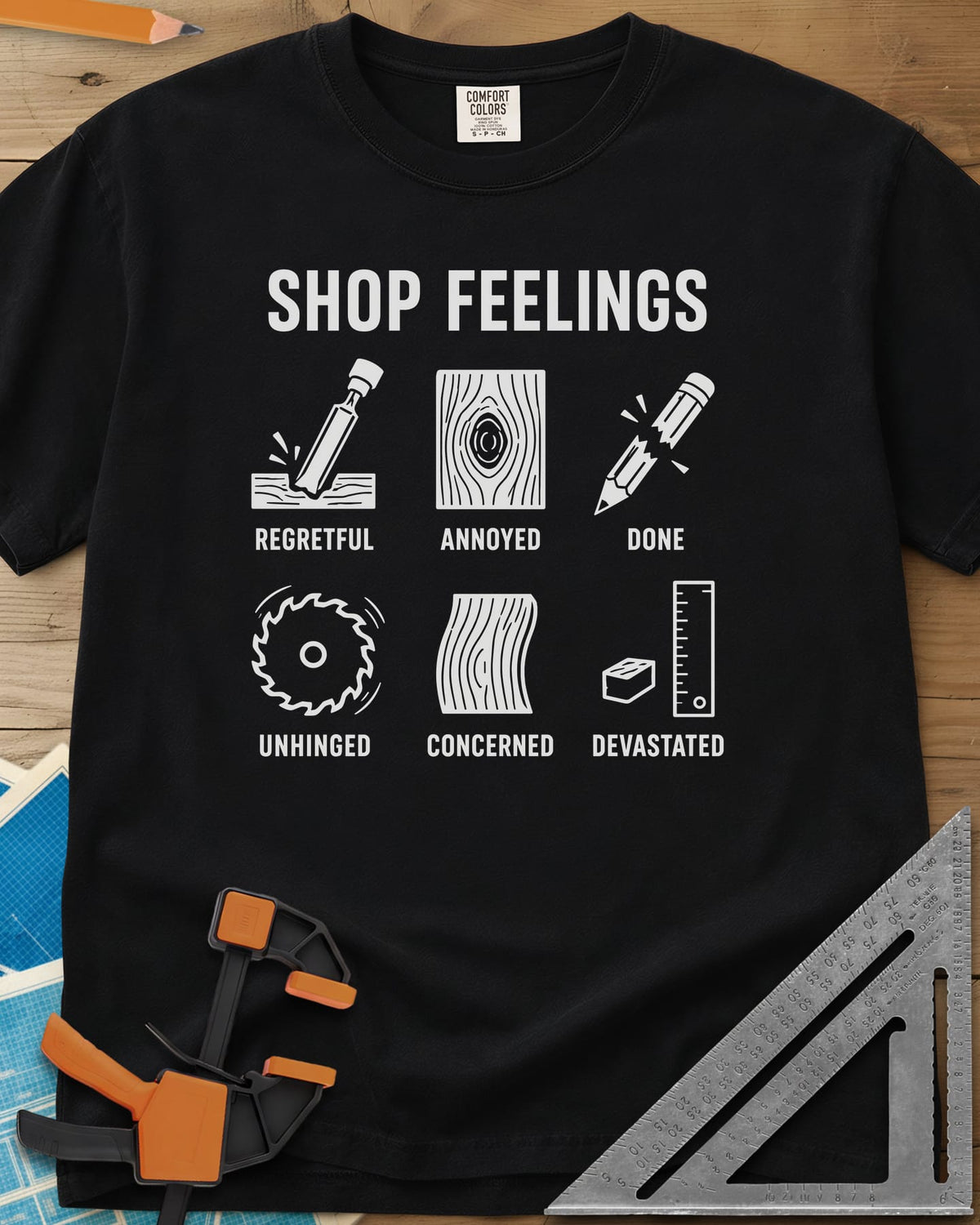 Shop Feelings heavyweight tee in Black, six small icons from a chisel to a snapped pencil, each labeled