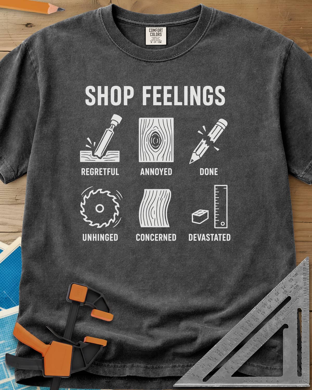 Shop Feelings heavyweight tee in Pepper, six small icons from a chisel to a snapped pencil, each labeled