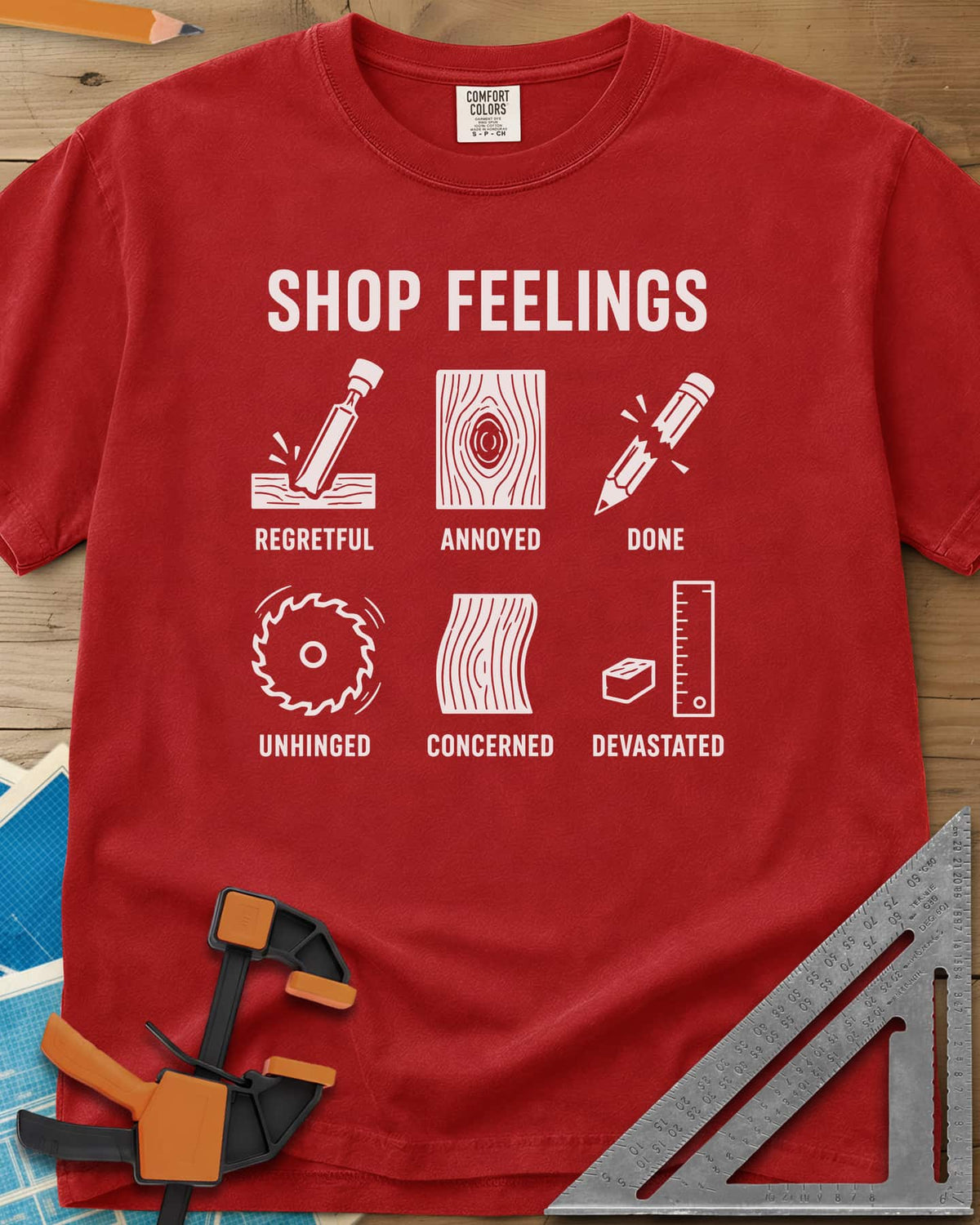 Shop Feelings heavyweight tee in Red, six small icons from a chisel to a snapped pencil, each labeled