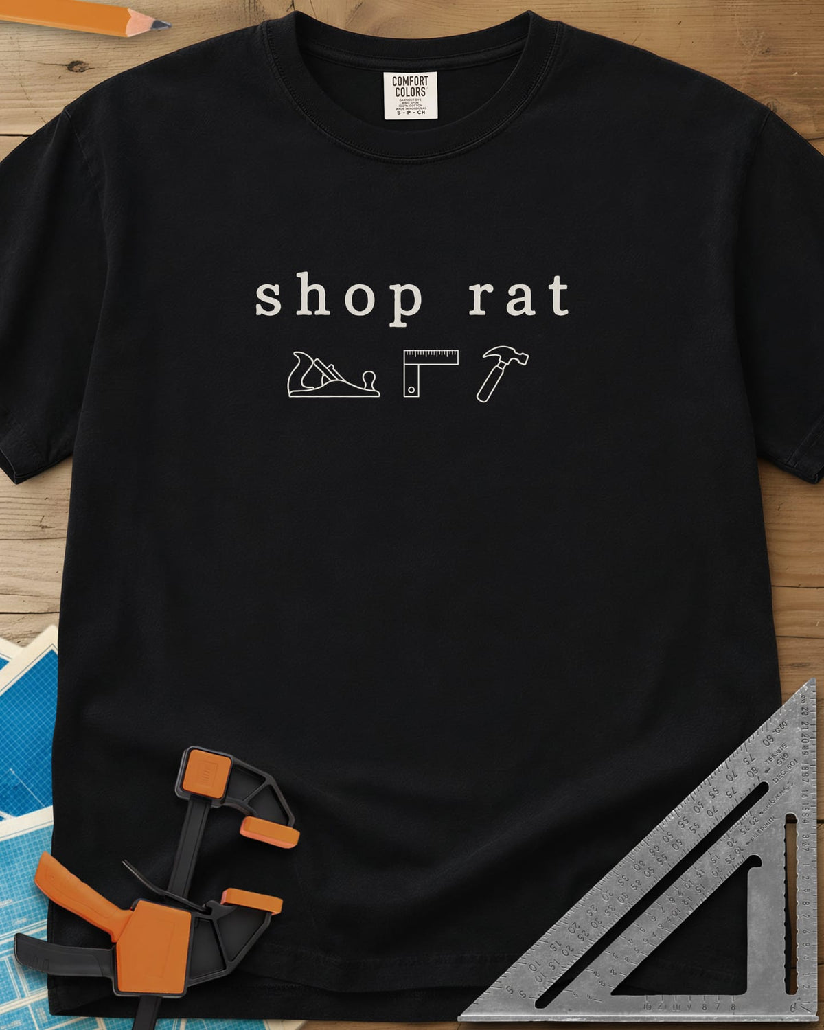 Shop Rat heavyweight tee in Black, a hand plane, a square and a hammer in thin outline