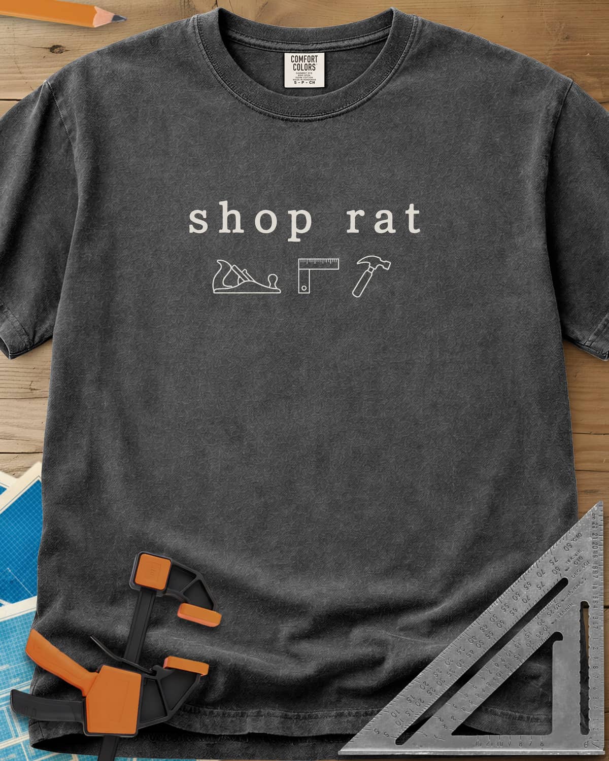 Shop Rat heavyweight tee in Pepper, a hand plane, a square and a hammer in thin outline