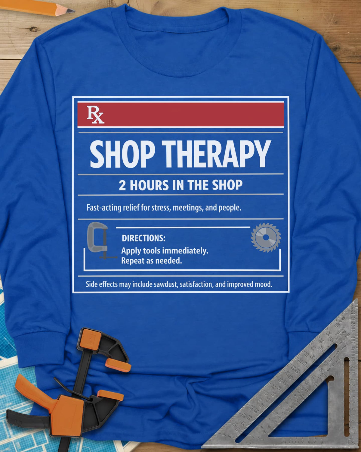 Shop Therapy long sleeve shirt in Royal, mock prescription label with clamp and saw blade icons