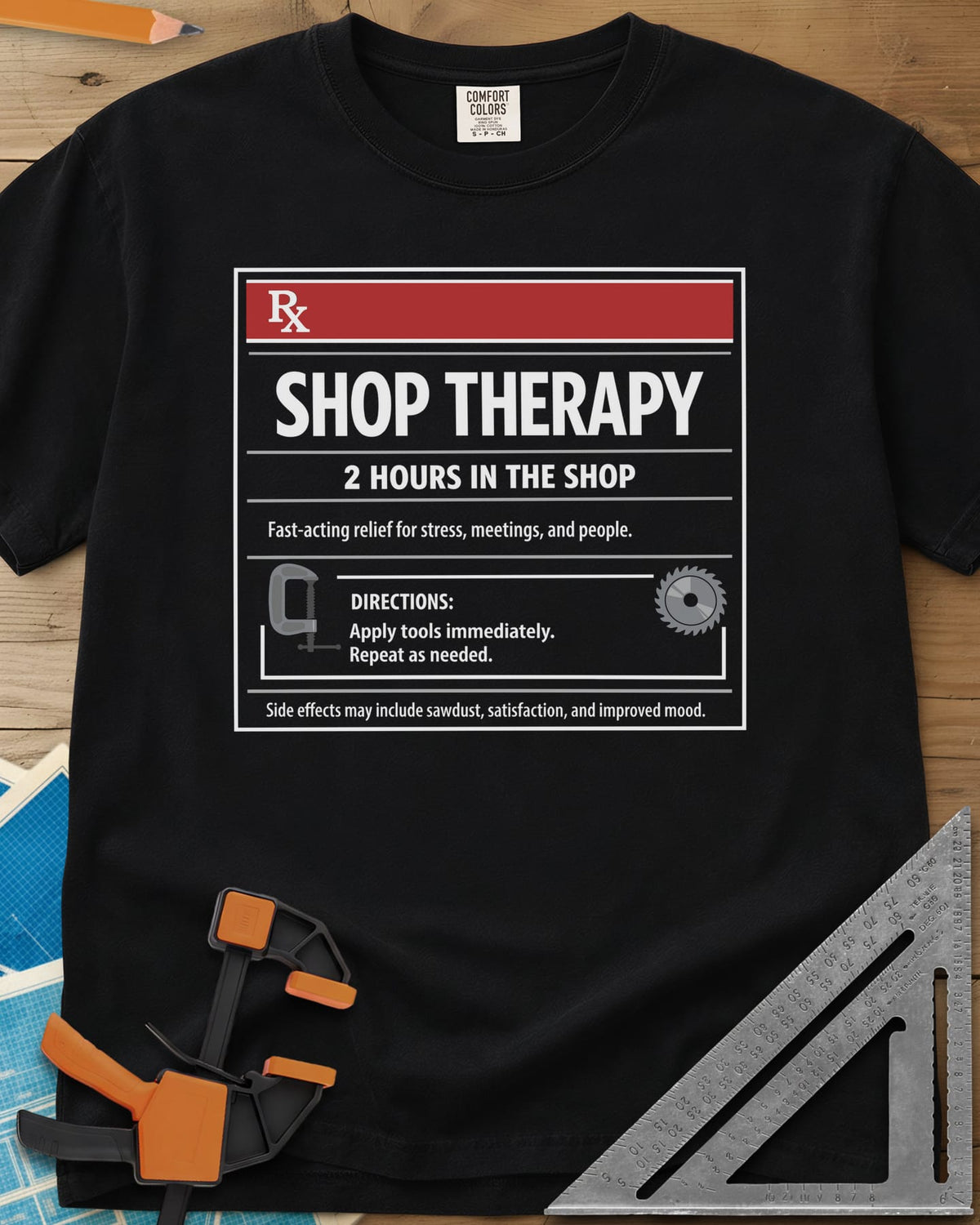 Shop Therapy heavyweight tee in Black, mock prescription label with clamp and saw blade icons