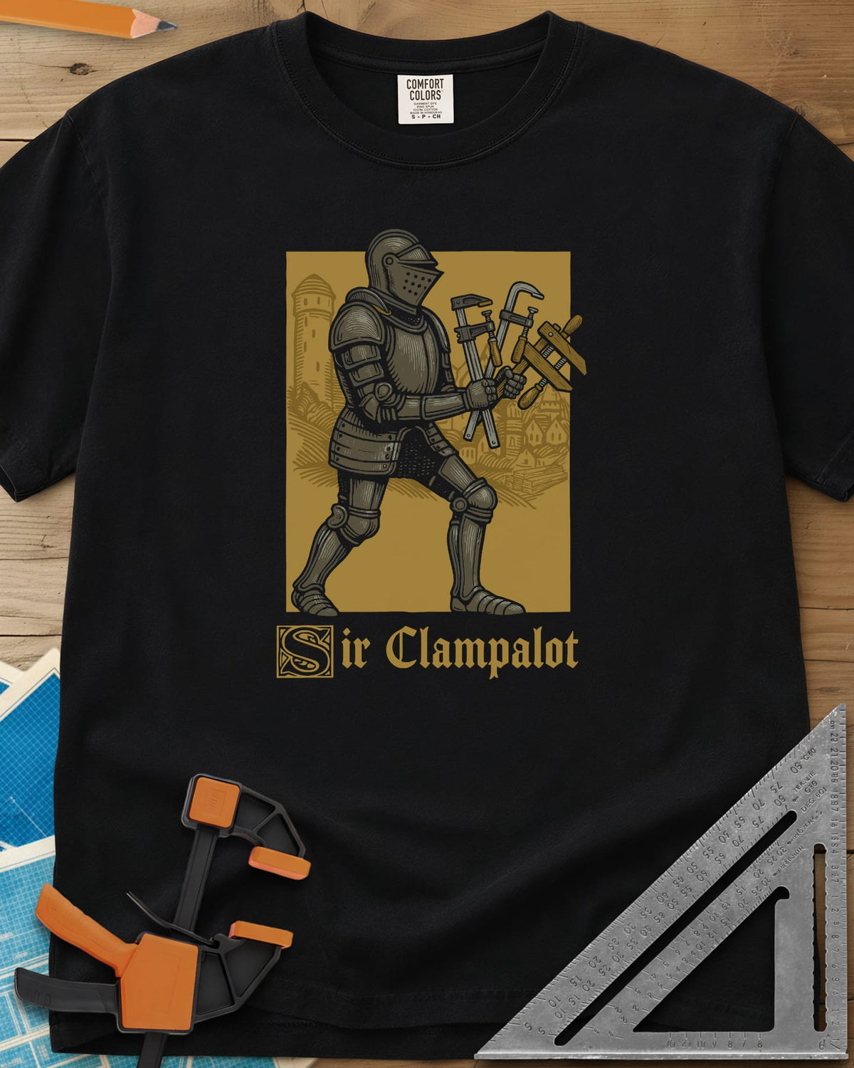 Sir Clampalot heavyweight tee in Black, an armored knight carrying an armful of clamps