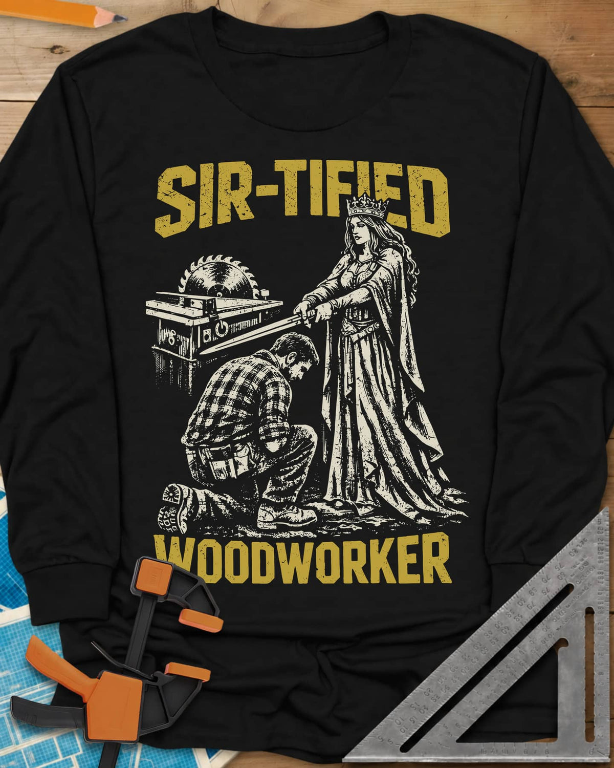Sir Tified Woodworker long sleeve shirt in Black, a queen knighting a kneeling woodworker beside a table saw