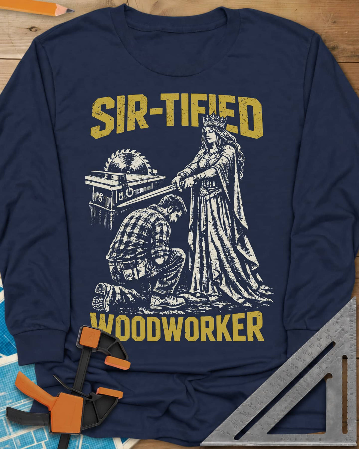 Sir Tified Woodworker long sleeve shirt in Navy, a queen knighting a kneeling woodworker beside a table saw