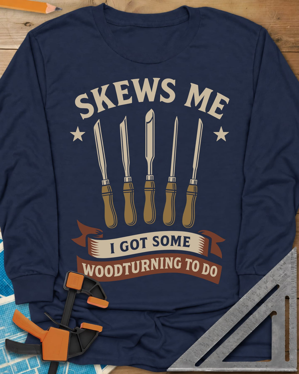 Skews Me long sleeve shirt in Navy, five turning tools between two stars above a ribbon banner