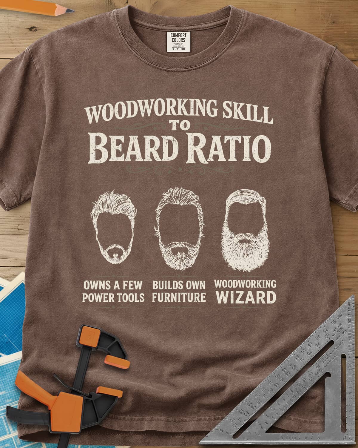 Skill To Beard Ratio heavyweight tee in Espresso, three bearded faces growing from a few power tools to wizard