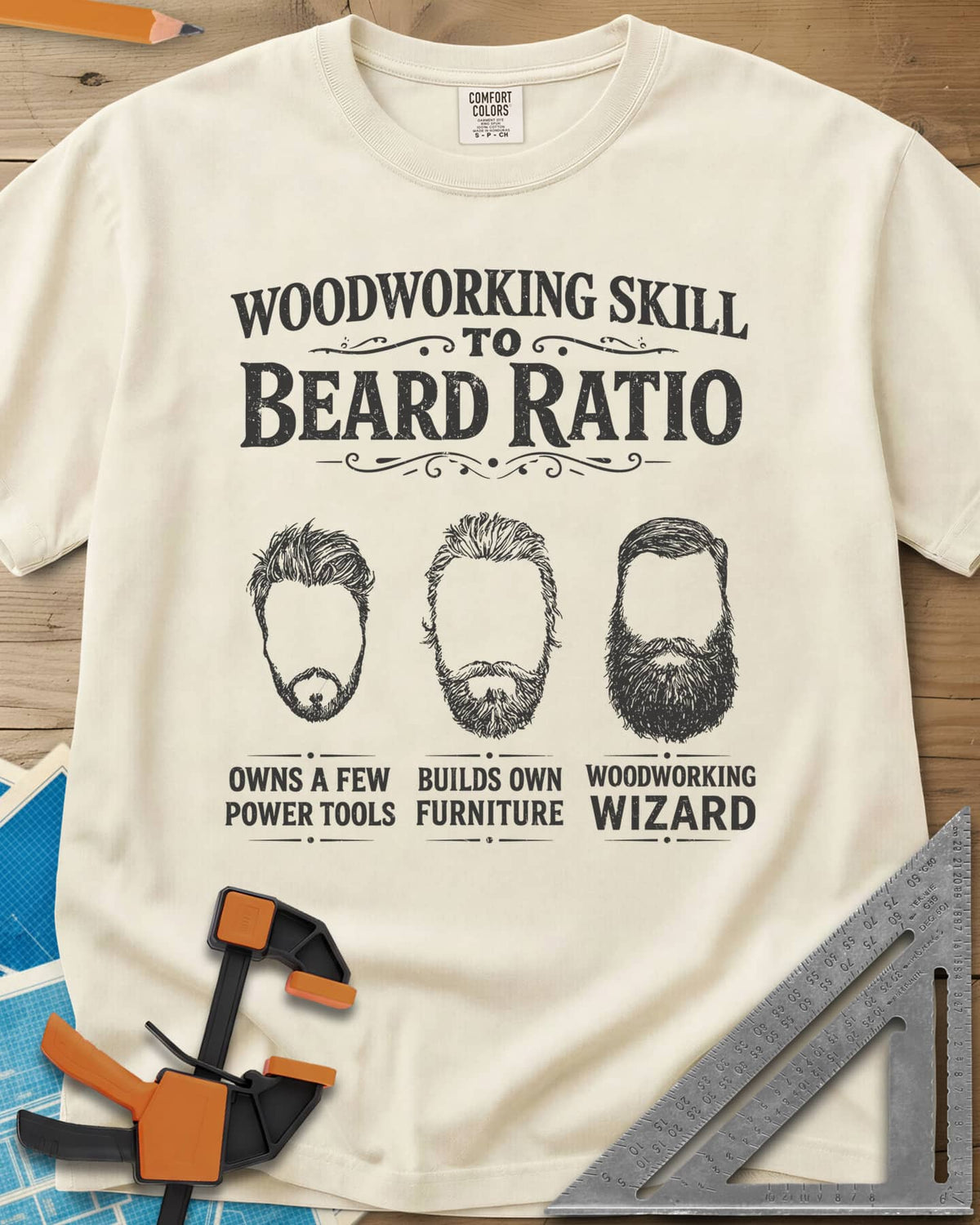 Skill To Beard Ratio heavyweight tee in Ivory, three bearded faces growing from a few power tools to wizard